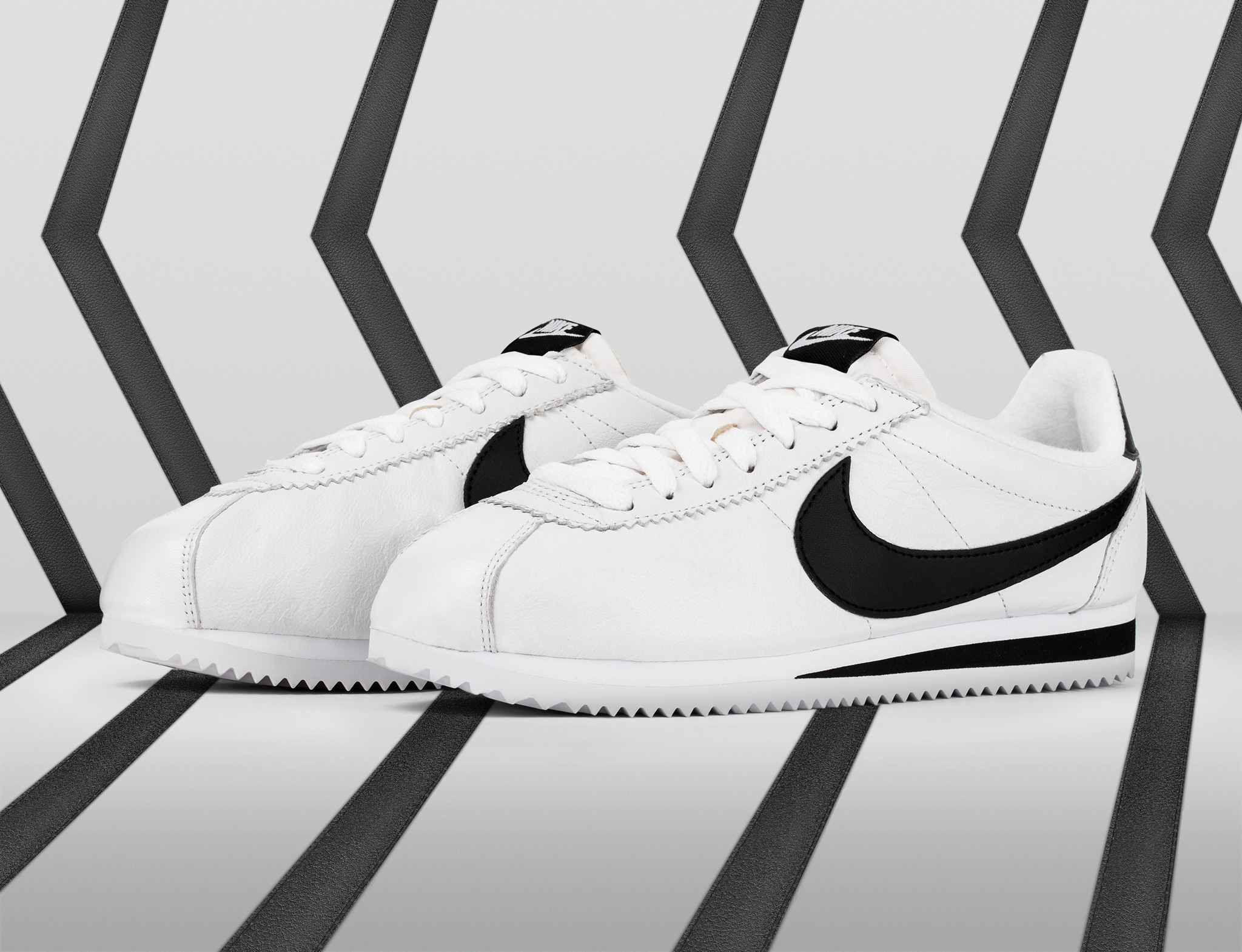 nike cortez nere e oro