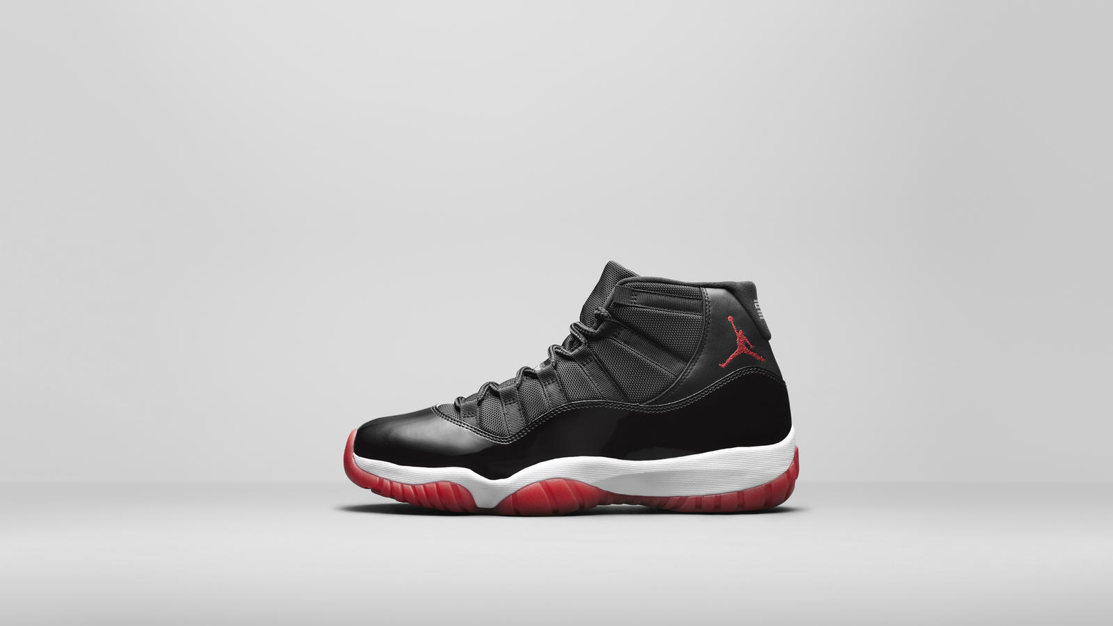 Air Jordan XI Black / True Red-White