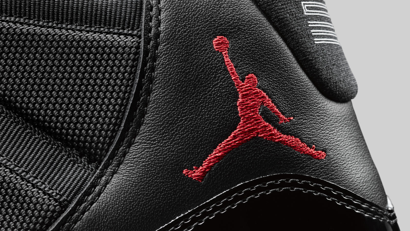 Air Jordan XI Black / True Red-White